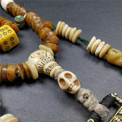 Gandhanra Authentic Tibetan Kapala Mala Necklace,Old Skull Bone Prayer Bead.This kapala mala was collected from Nyingma Kathok monastery, and has been passed down since the 1970's,used and blessed by lamas.
It's made according to traditional rituals, and accessories are gradually added,collection level.