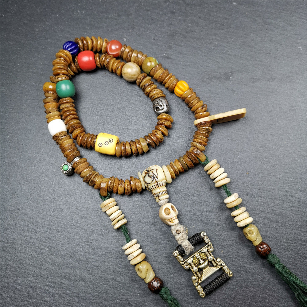 Gandhanra Authentic Tibetan Kapala Mala Necklace,Old Skull Bone Prayer Bead.This kapala mala was collected from Nyingma Kathok monastery, and has been passed down since the 1970's,used and blessed by lamas.
It's made according to traditional rituals, and accessories are gradually added,collection level.