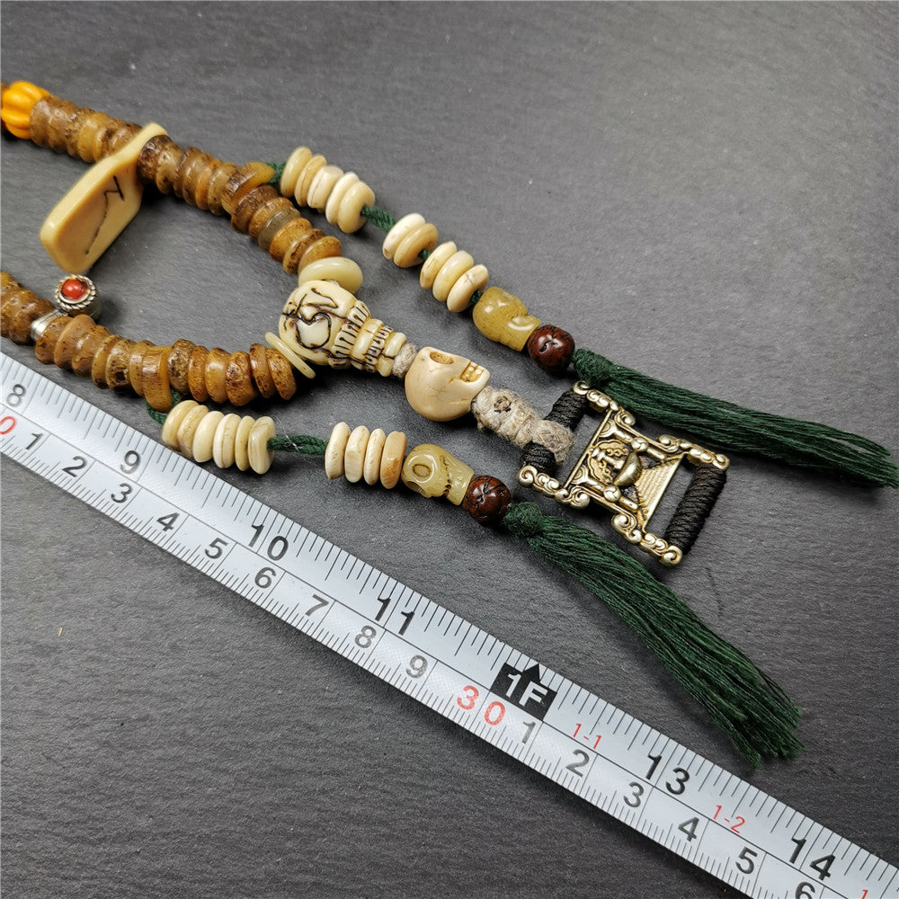 Gandhanra Authentic Tibetan Kapala Mala Necklace,Old Skull Bone Prayer Bead.This kapala mala was collected from Nyingma Kathok monastery, and has been passed down since the 1970's,used and blessed by lamas.
It's made according to traditional rituals, and accessories are gradually added,collection level.