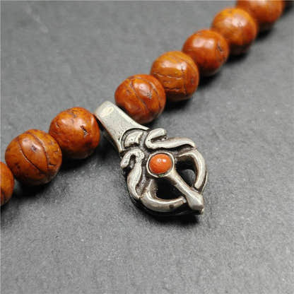 Silver Bhum Counter Clip for Mala - Tibetan Buddhist mala beads, close-up detail