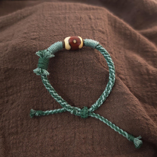 Jumlum Hand Woven Bracelet with Fire Agate Tibetan 3 Eyes Mandala Dzi Beads