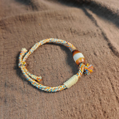 Jumlum Hand Woven Bracelet with Fire Agate Tibetan Stripe Dzi Beads