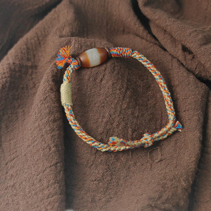 Jumlum Hand Woven Bracelet with Fire Agate Tibetan Stripe Dzi Beads