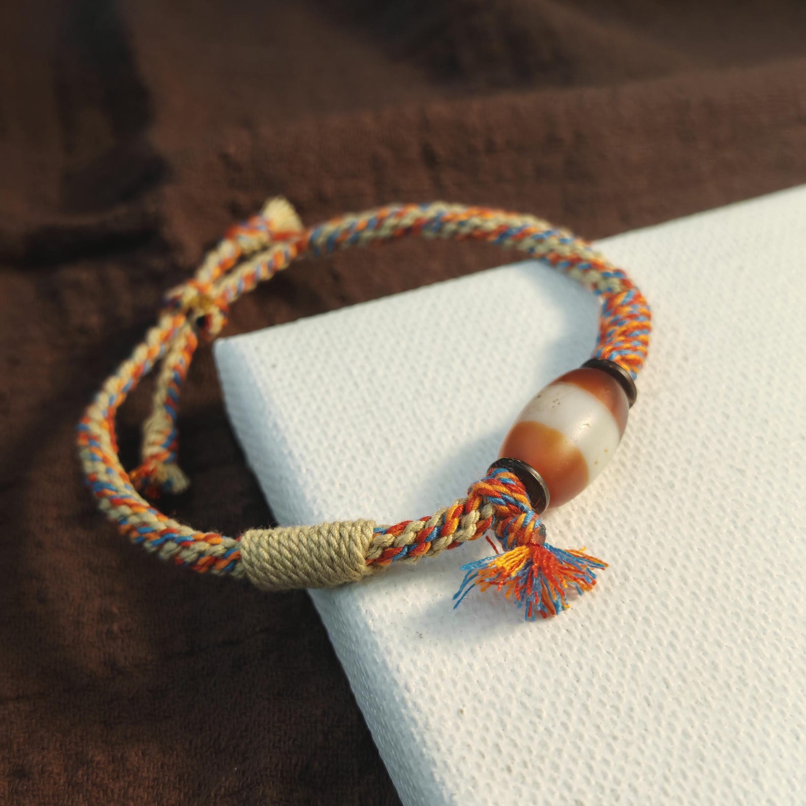 Jumlum Hand Woven Bracelet with Fire Agate Tibetan Stripe Dzi Beads