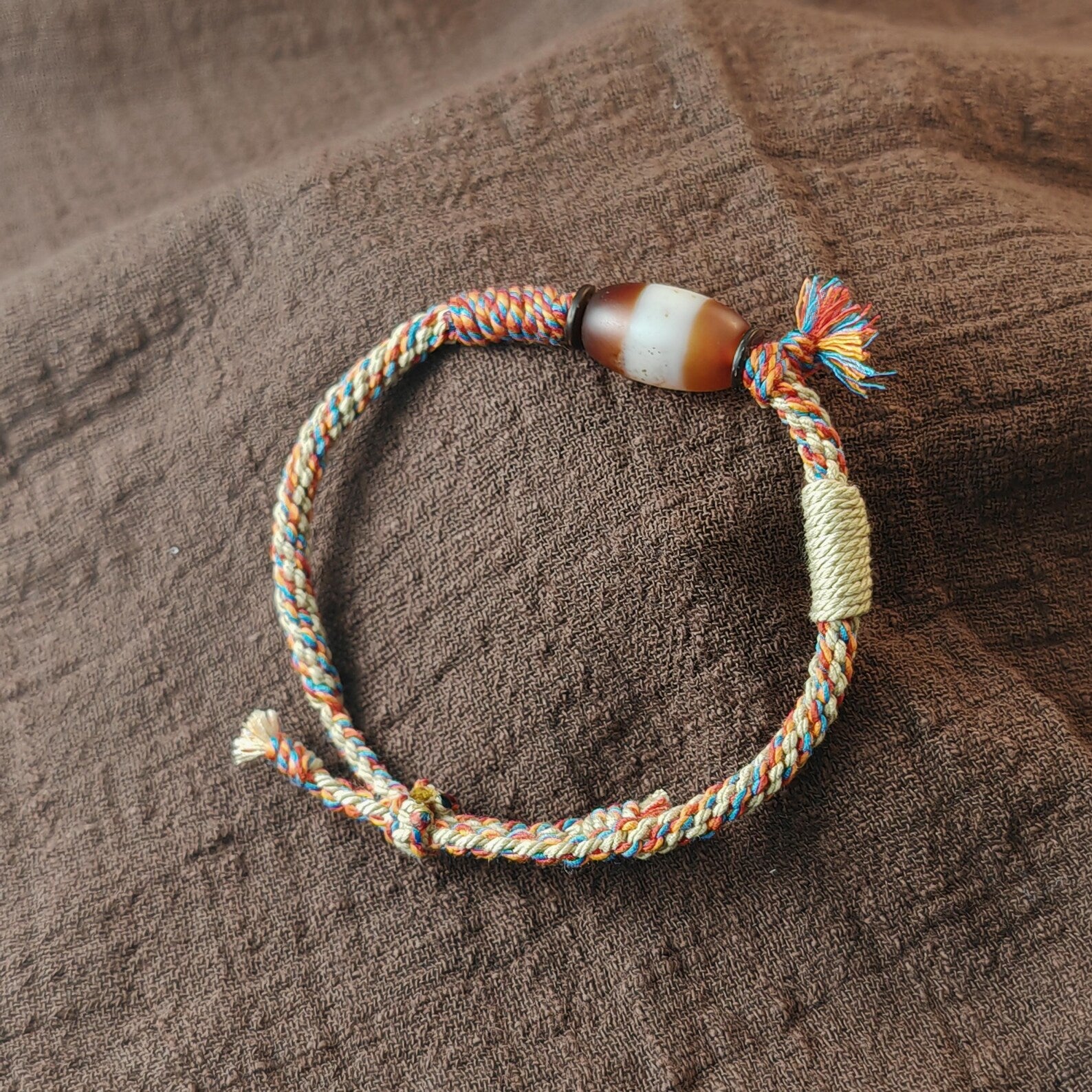 Jumlum Hand Woven Bracelet with Fire Agate Tibetan Stripe Dzi Beads