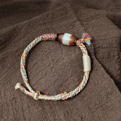Jumlum Hand Woven Bracelet with Fire Agate Tibetan Stripe Dzi Beads