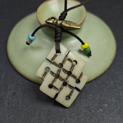 Lucky Knot Amulet / Endless Knot Pendant - Handcarved Yak Bone Pendant - Keychain & Bang Hanging