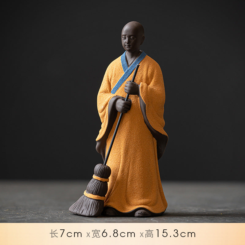 Sweeping Monk Buddha Statue