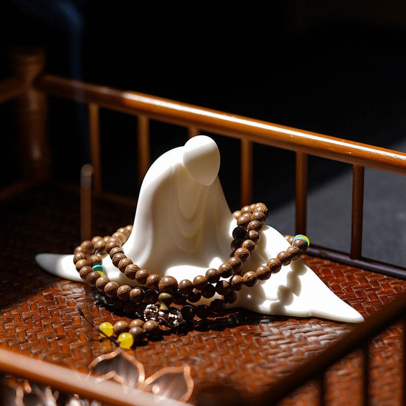 White Porcelain Buddha Statues - Tibetan Buddhist statue, close-up detail