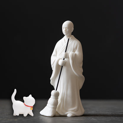 Sweeping Monk Buddha Statue