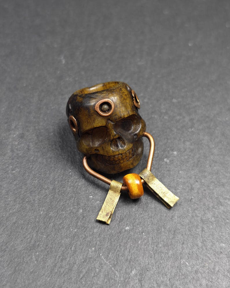 Tibetan Citipati Skull Pendant - 27 - Tibetan Buddhist amulet, front view