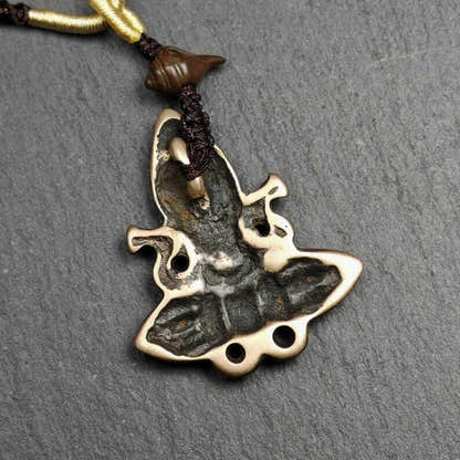 Tibetan Amulet - Tibetan Buddhist amulet, detailed view