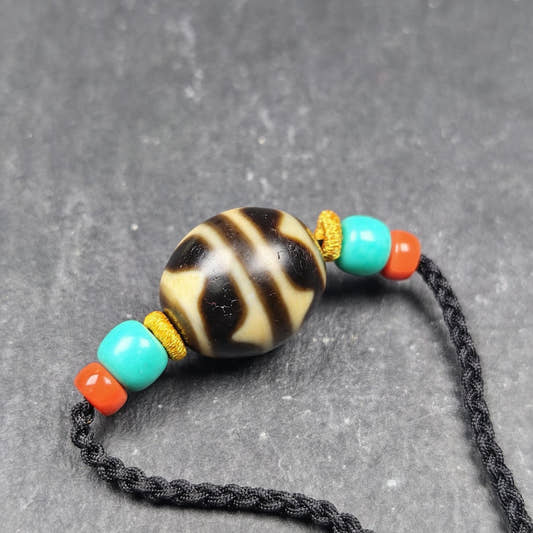 Tiger Tooth Dzi Bead Necklace - Tibetan Buddhist bead necklace, front view