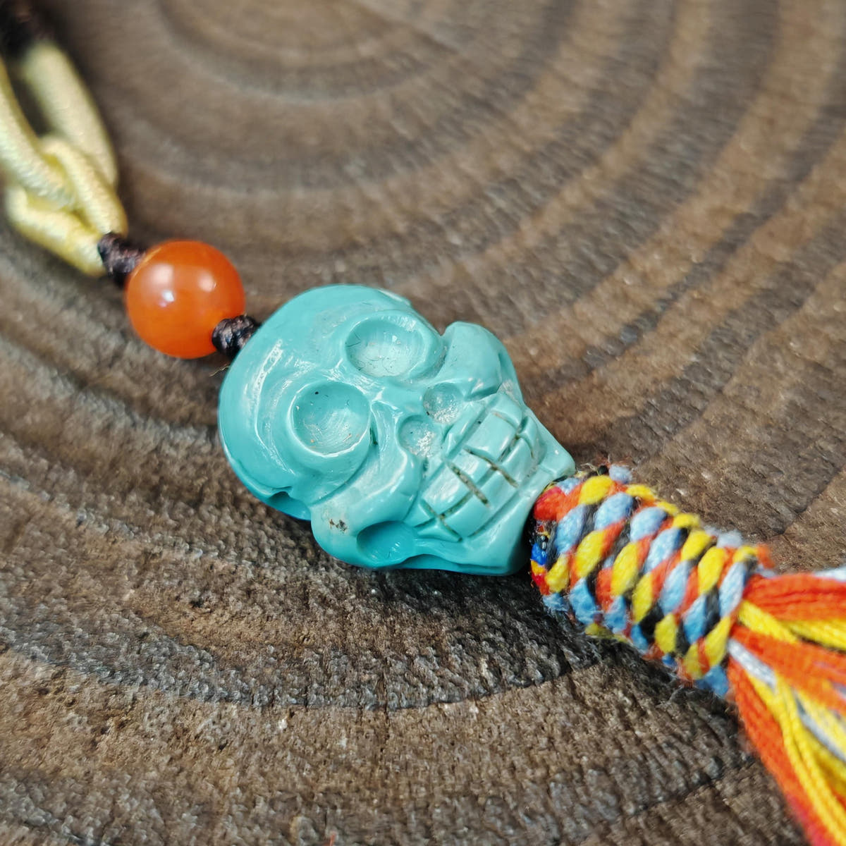 Turquoise Citipati Skull Pendant Decades Old - 18mm - Tibetan Buddhist amulet, close-up detail