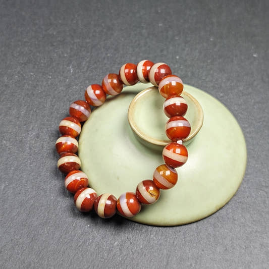 Red Medicine Buddha Dzi Wrist Mala Decades Old - Tibetan Buddhist mala beads, front view