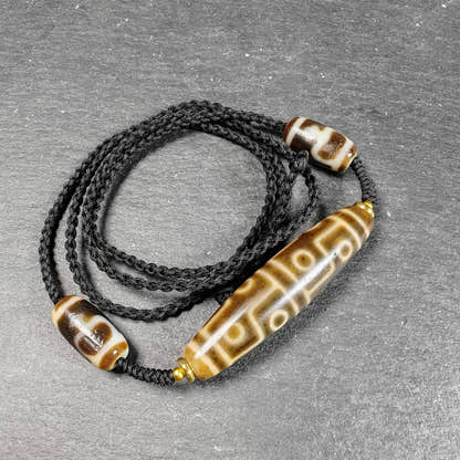 12 Eyes Dzi Bead Necklace Tibetan Protection Charm for Courage and Fame - Tibetan Buddhist bead necklace, detailed view