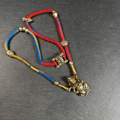 Yellow Jambhala Wealth Deity Amulet, Hand Woven Five-Color Cord Tibetan Pendant, Brass Buddhist Protection Talisman