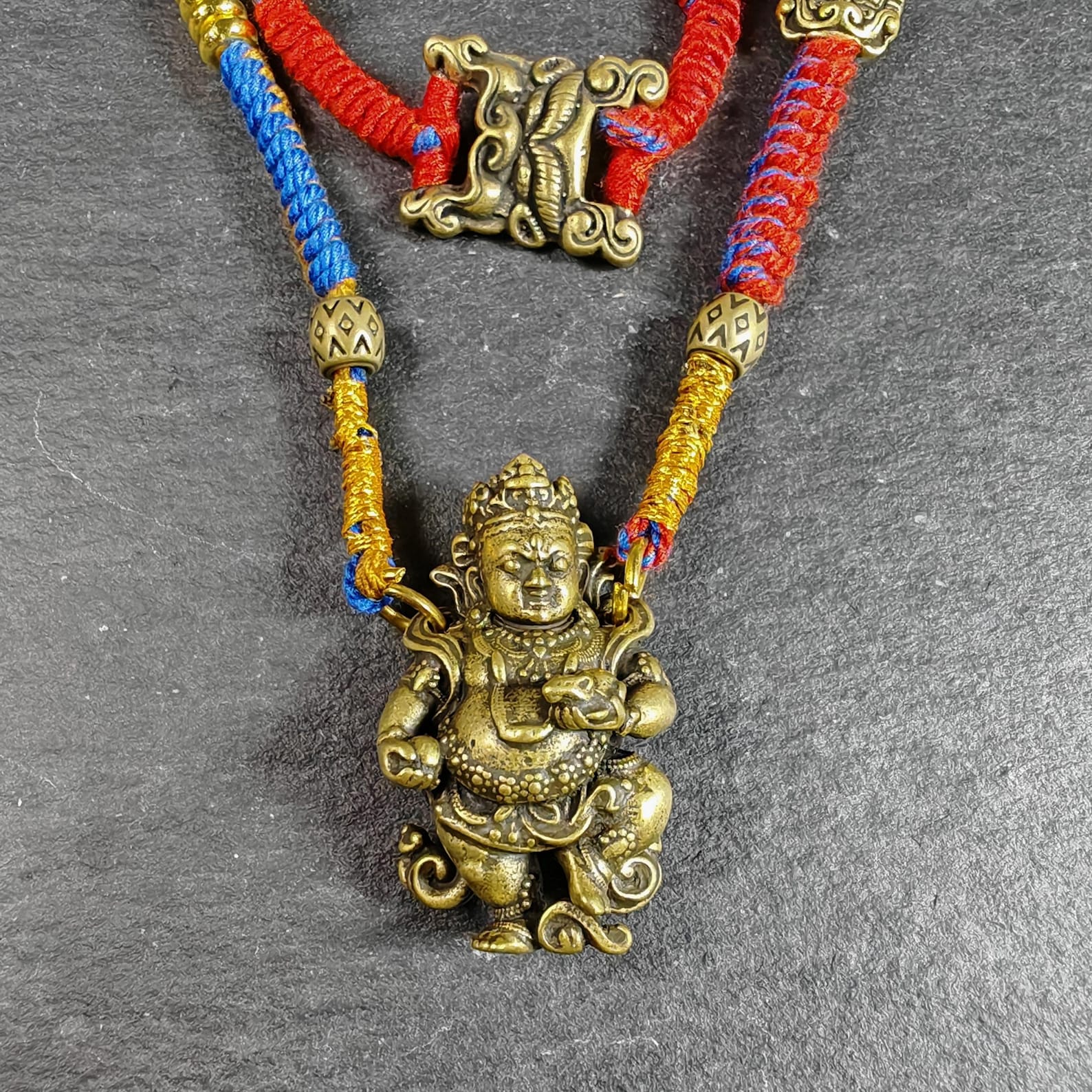 Yellow Jambhala Wealth Deity Amulet, Hand Woven Five-Color Cord Tibetan Pendant, Brass Buddhist Protection Talisman