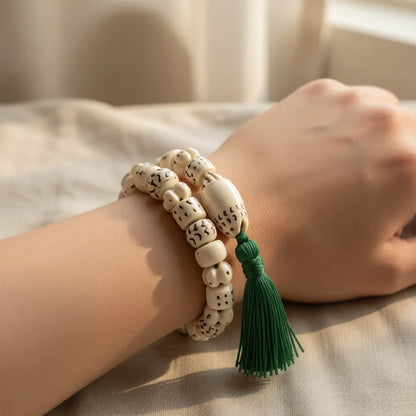 Tibetan Conch Shell Wrist Mala Bracelet - Tibetan Buddhist mala beads, front view