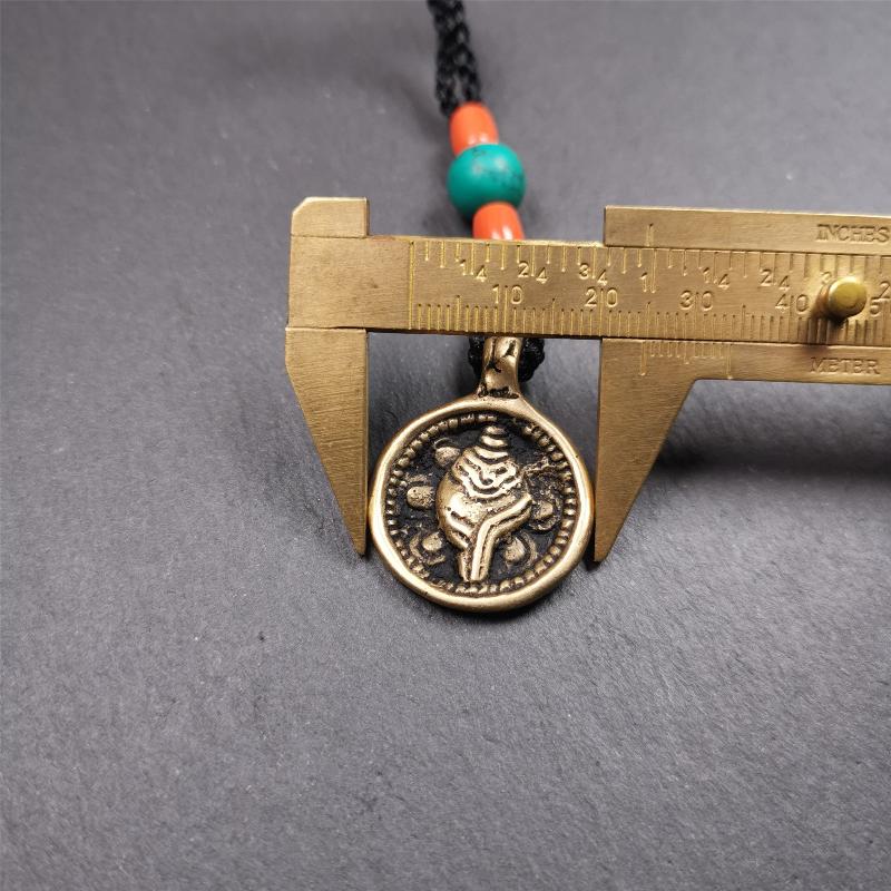 Conch Amulet 0.98" - Tibetan Buddhist amulet, size reference