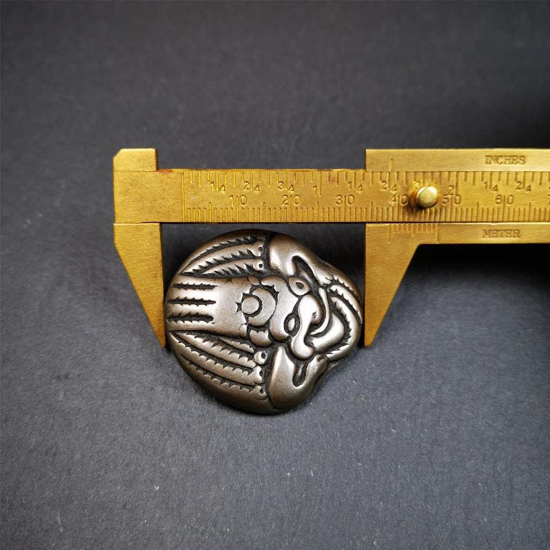 Garuda Amulet - 1.54" - Tibetan Buddhist amulet, size reference