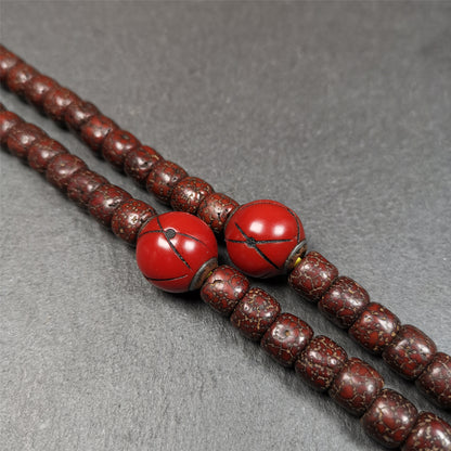 These marker beads were handmade by Tibetan craftsmen. It is made of plastic,inlaid copper and cold iron,red color,size is 0.6" × 0.6". Fit for 8-15mm mala (The reference in the photo is 8mm mala)