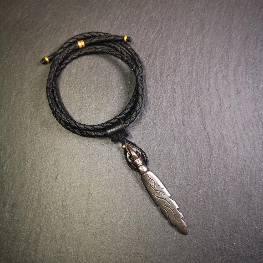 This Fire Sword amulet was handmade by Tibetan craftsmen in 2000s. It is black color,2.8 inches length. You can carry it as a necklace pendant or key chain. The Manjusri is often depicted holding a sword, referred to as the sword of wisdom.