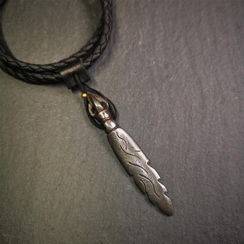 This Fire Sword amulet was handmade by Tibetan craftsmen in 2000s. It is black color,2.8 inches length. You can carry it as a necklace pendant or key chain. The Manjusri is often depicted holding a sword, referred to as the sword of wisdom.