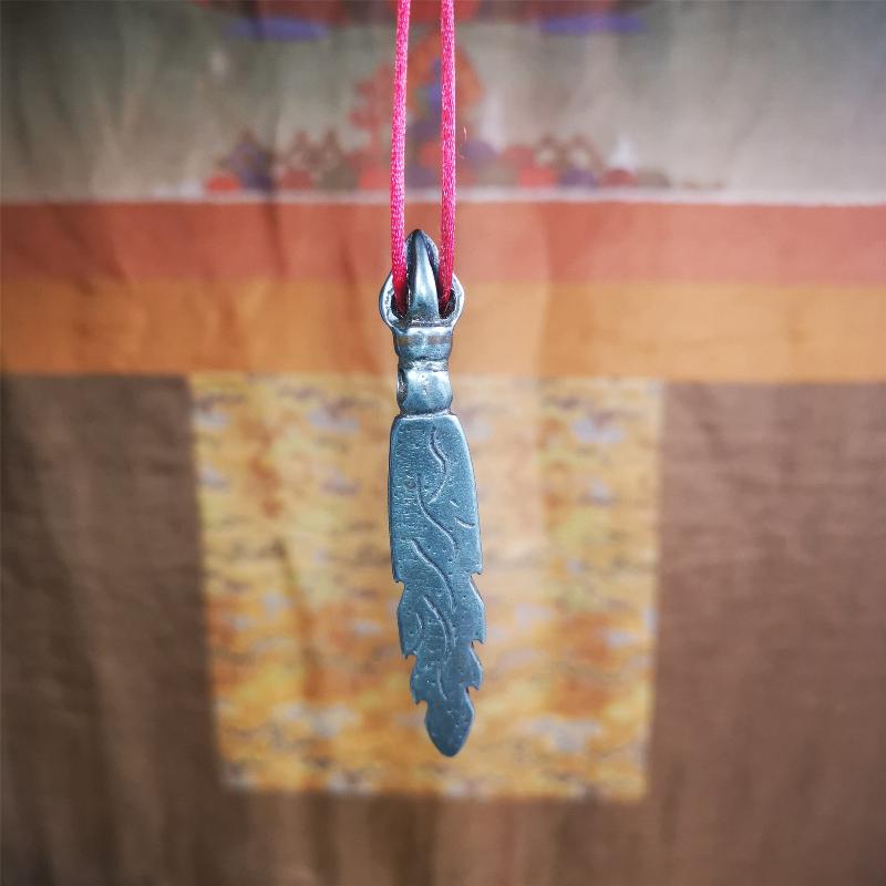 This Fire Sword amulet was handmade by Tibetan craftsmen in 2000s. It is black color,2.8 inches length. You can carry it as a necklace pendant or key chain. The Manjusri is often depicted holding a sword, referred to as the sword of wisdom.