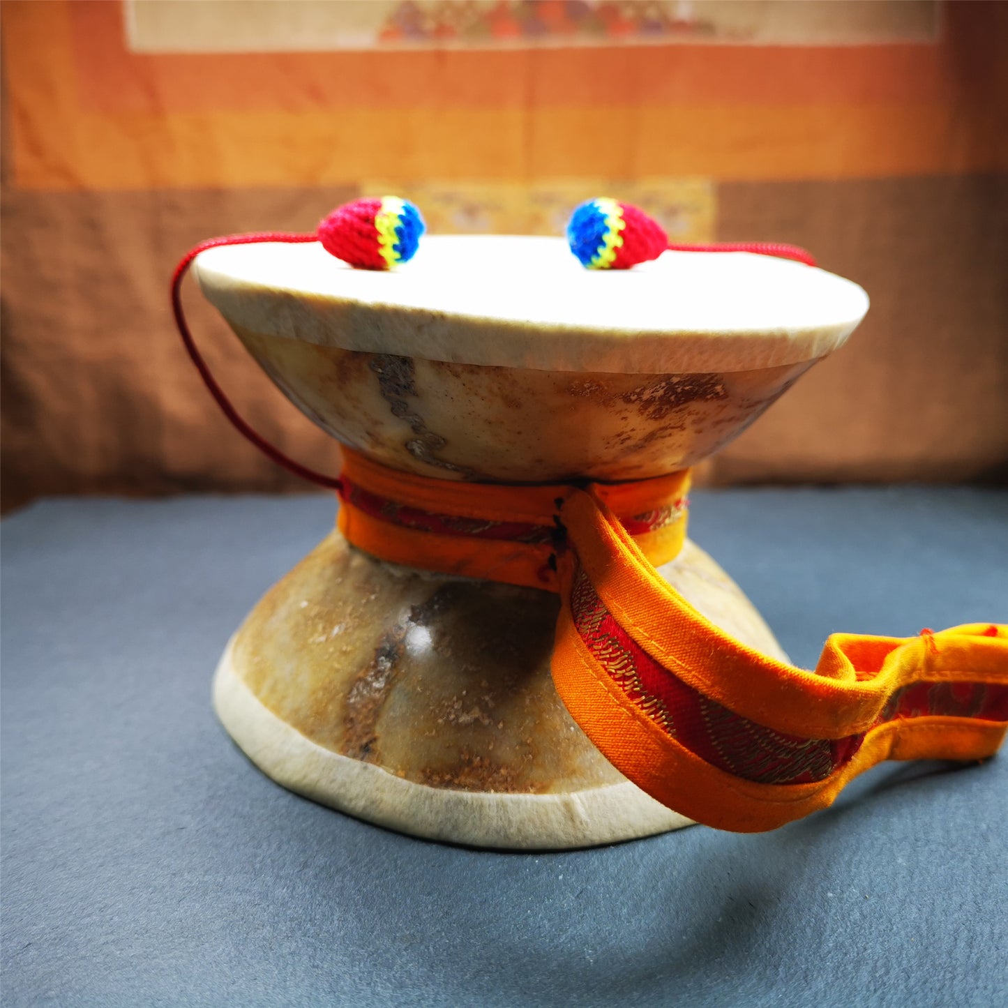 This kapala Damaru Chod Drum was collected from Baiyu Tibet,made from Rejia Monastery and blessed by lama. It is made with traditional craftsmanship,use 2 kapala,sheepskin and cotton.