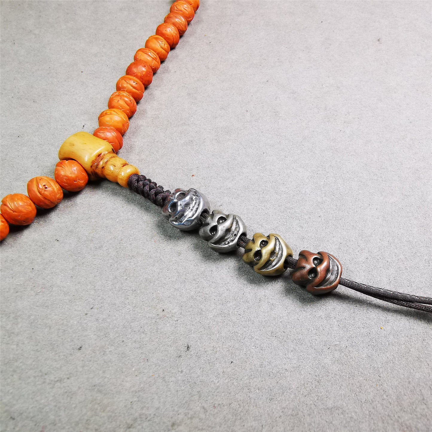 These skull shape spacer beads are made by Tibetan craftsmen and come from Hepo Town, Baiyu County, the birthplace of the famous Tibetan handicrafts. You can use it as a spacer bead on mala,or pendant bead under guru bead.