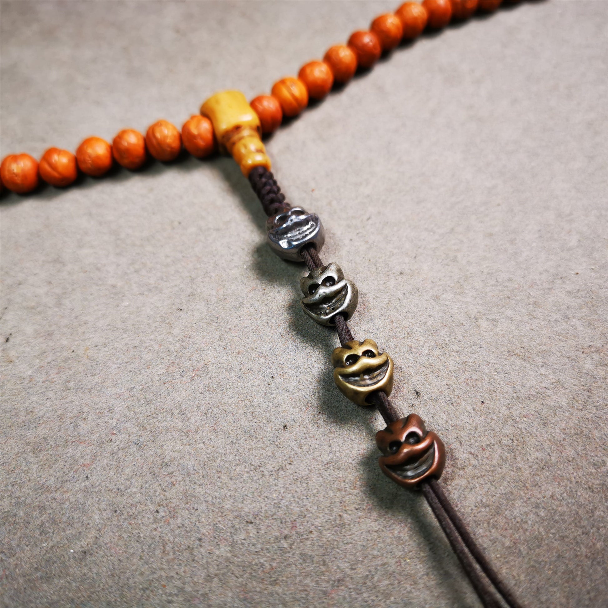 These skull shape spacer beads are made by Tibetan craftsmen and come from Hepo Town, Baiyu County, the birthplace of the famous Tibetan handicrafts. You can use it as a spacer bead on mala,or pendant bead under guru bead.