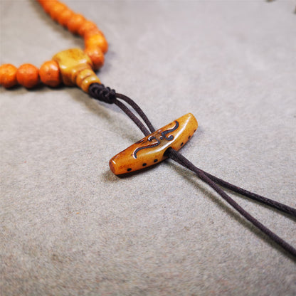 This unique bone carved ruyi pendant is made by Tibetan craftsmen in Hepo Township, Baiyu County, the birthplace of the famous Tibetan handicrafts.  You can use it as a spacer bead on mala,or pendant bead under guru bead. Also can be use as amulet pendant or keychain.