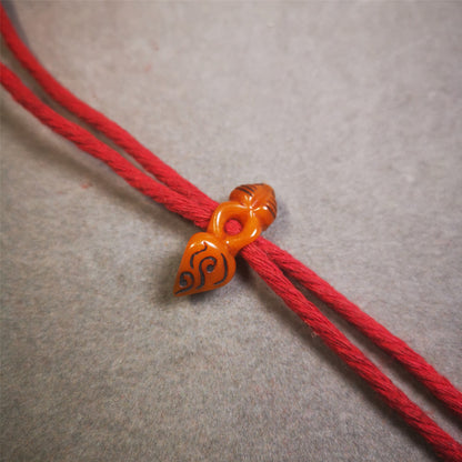 This unique bone carved phurba pendant is made by Tibetan craftsmen in Hepo Township, Baiyu County, the birthplace of the famous Tibetan handicrafts.  You can use it as a spacer bead on mala,or pendant bead under guru bead. Also can be use as amulet pendant or keychain.