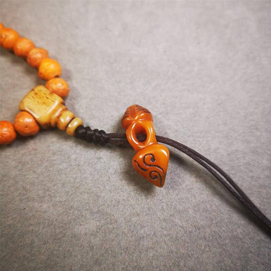 Bone Phurba Amulet 1.18" - Tibetan Buddhist amulet, front view