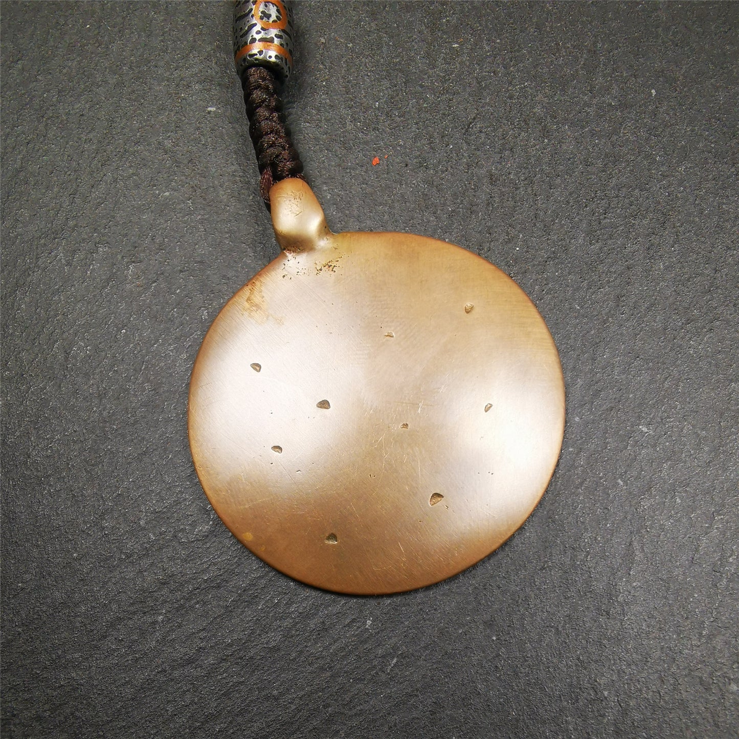 This unique tibetan melong badge was collected from Kathok Monastery,about 50 years old. It's a Astrology Protective Amulet Pendant,made of lima brass. The pattern is Tibetan Budhist Protective Amulet Pendant - SIPAHO(srid pa ho).