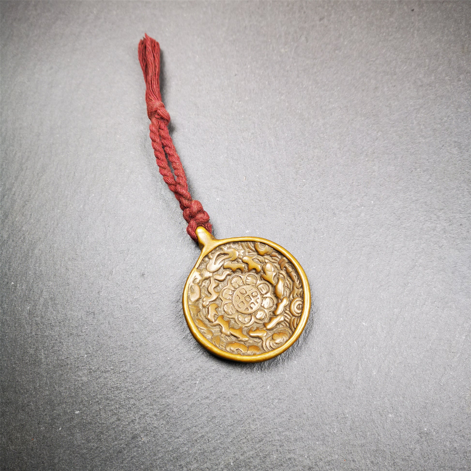 This amulet was collected in Baiyu County Tibet,about 30 years old. It's a Astrology Protective Amulet Pendant,made of red copper. The pattern is Tibetan Budhist Protective Amulet Pendant - SIPAHO