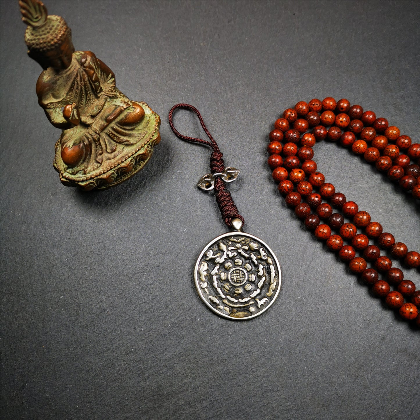 This unique tibetan melong badge was collected from Garzi Monastery for 20 years. It's a Astrology Protective Amulet Pendant,made of cold iron. The pattern is Tibetan Budhist Protective Amulet Pendant - SIPAHO(srid pa ho).  SIPAHO Melong Amulet on the cord,when on a go or travelling, it's placed as a waist badge. You can make it into pendant,keychain, bag hanging,or just put it on your desk,as an ornament. The wearing of Srid-Pa-Ho heightens awareness, and protects body and mind from negative influences.