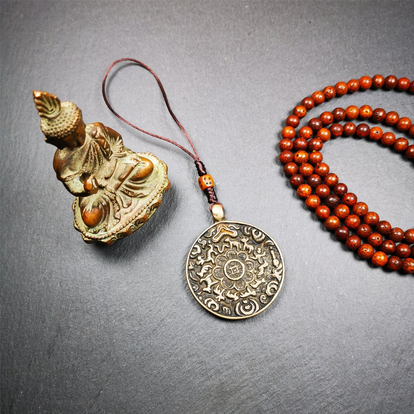 This unique tibetan calendar melong badge was collected from Kathok Monastery,about 50 years old. It's a Astrology Protective Amulet Pendant,made of thokcha,the pattern is Tibetan Budhist Protective Amulet Pendant - SIPAHO(srid pa ho).