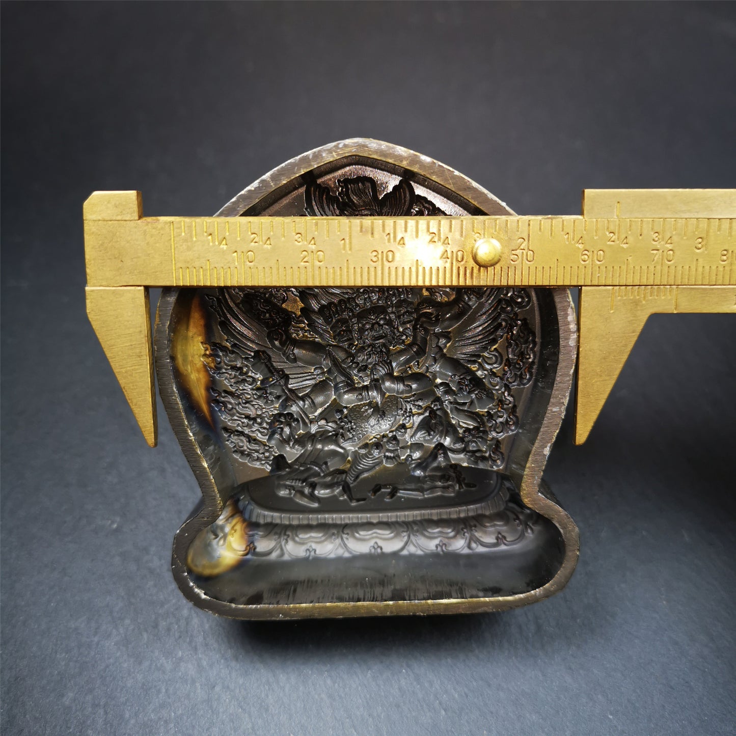 This Vajrakilaya Tsa-Tsa is made by Tibetan craftsmen in Hepo Town, Baiyu County. It is made of brass,yellow color,the shaple is Vajrakilaya,about 2.8inches height. With this mold, you can use clay to make your own Buddha statue.