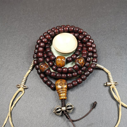 This mala is made by Tibetan craftsmen and come from Hepo Town, Baiyu County,Tibet, the birthplace of the famous Tibetan handicrafts,about 30 years old,blessed by a lama in Baiyu Monastery. It's composed of 108 pcs 8mm lotus seed beads,then add some old bone beads,1 pair of silver bead counters,and silver guru bead,vajra pandent 