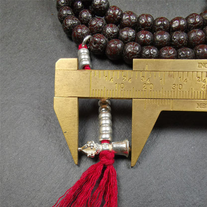 This mala is made by Tibetan craftsmen and come from Hepo Town, Baiyu County,Tibet, the birthplace of the famous Tibetan handicrafts. It's composed of 108 pcs 8mm lotus seed beads,with agate beads,and silver bead counters.
