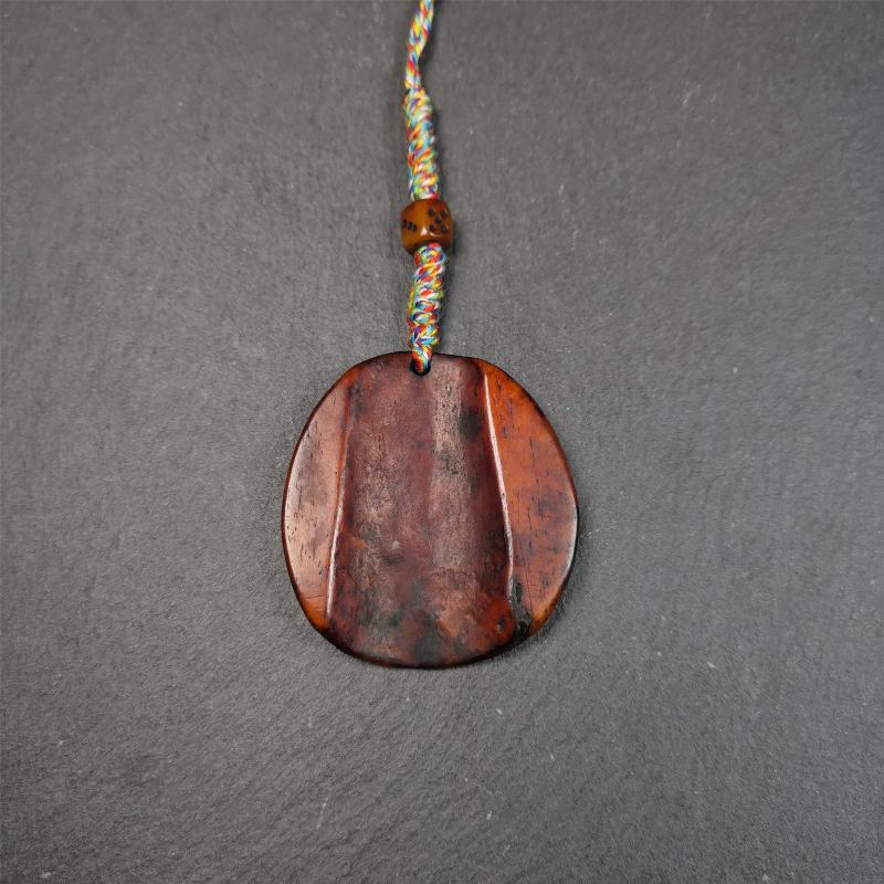 This cross vajra badge amulet was hand carved by Tibetan craftsmen and come from Hepo Town, Baiyu County, the birthplace of the famous Tibetan handicrafts. It is made of yak bone, completely hand-carved, very delicate.