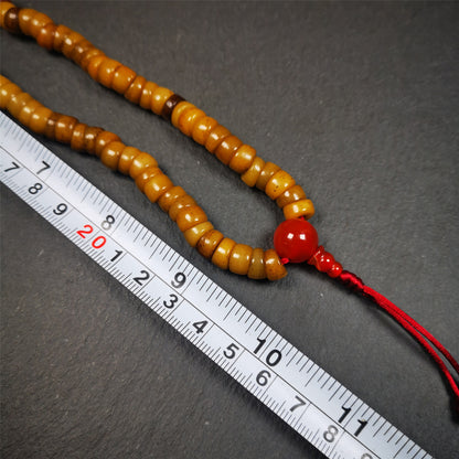 This yak bone mala was handmade from tibetan crafts man in Baiyu County,about 30 years old. It's composed of 108 pcs bevel cut 8mm yak bone beads,with agate beads,guru bead.