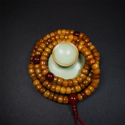 This yak bone mala was handmade from tibetan crafts man in Baiyu County,about 30 years old. It's composed of 108 pcs bevel cut 9mm bone beads,with agate beads,guru bead.