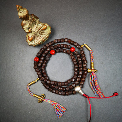 This old Rudraksha mala was handmade from tibetan crafts man in Baiyu County. It's composed of 108 pcs 8mm Rudraksha beads,with agate beads,1 pair of bead counters,and guru bead.