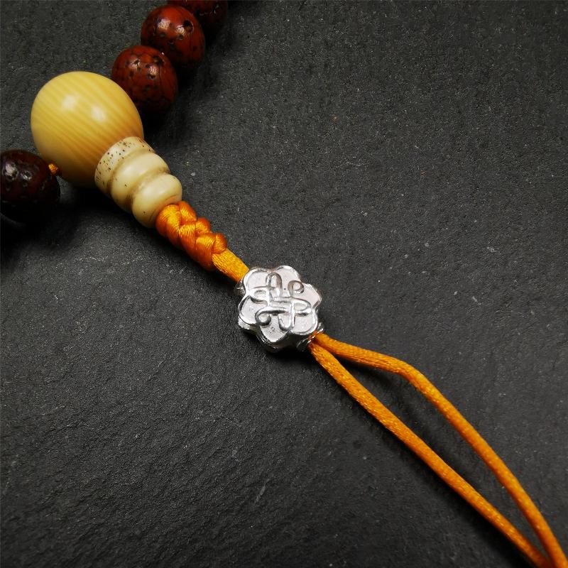 Sterling Silver Lucky Knot Bead,0.4" - Tibetan Buddhist art, front view