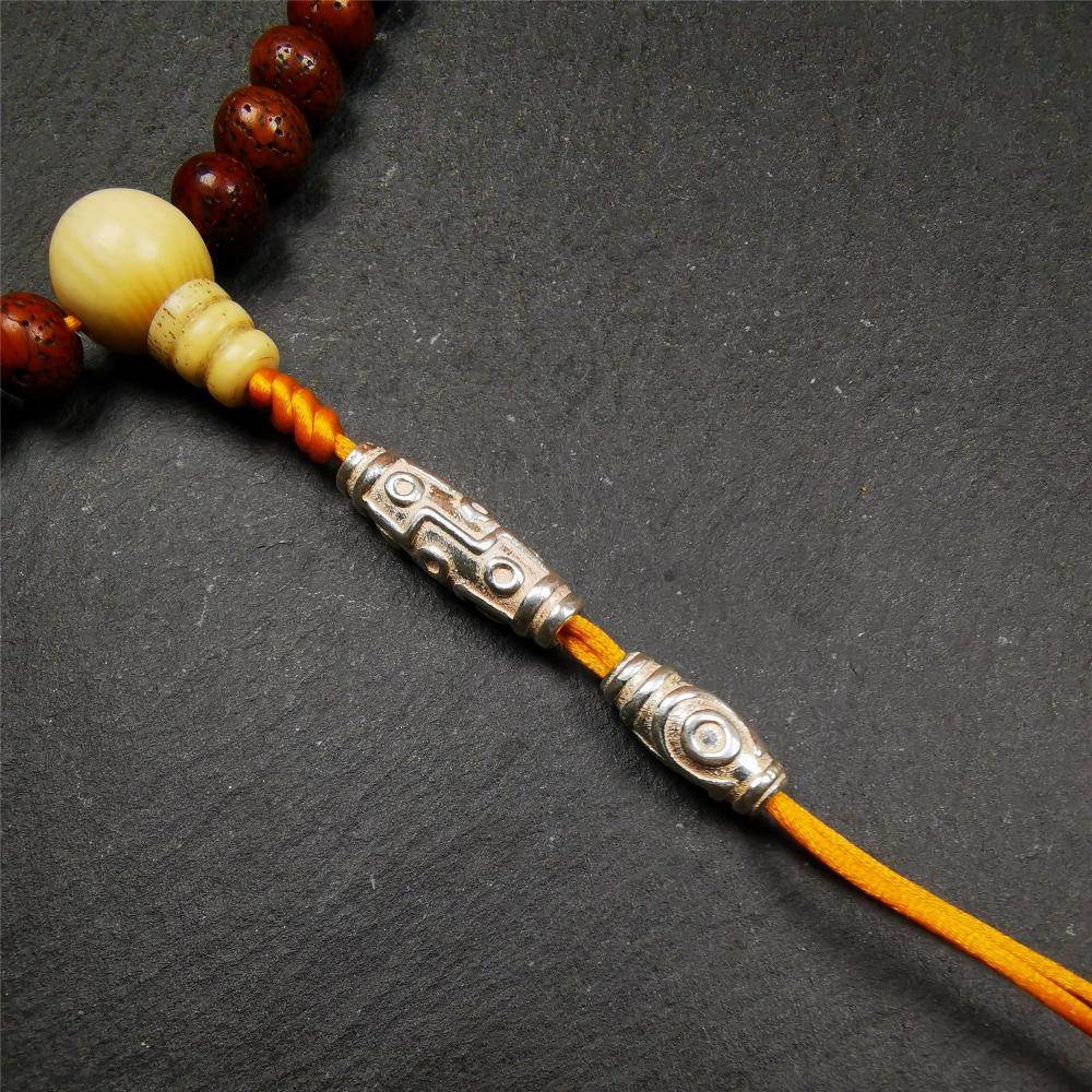 Sterling Silver Dzi Bead - Tibetan dzi bead, close-up detail
