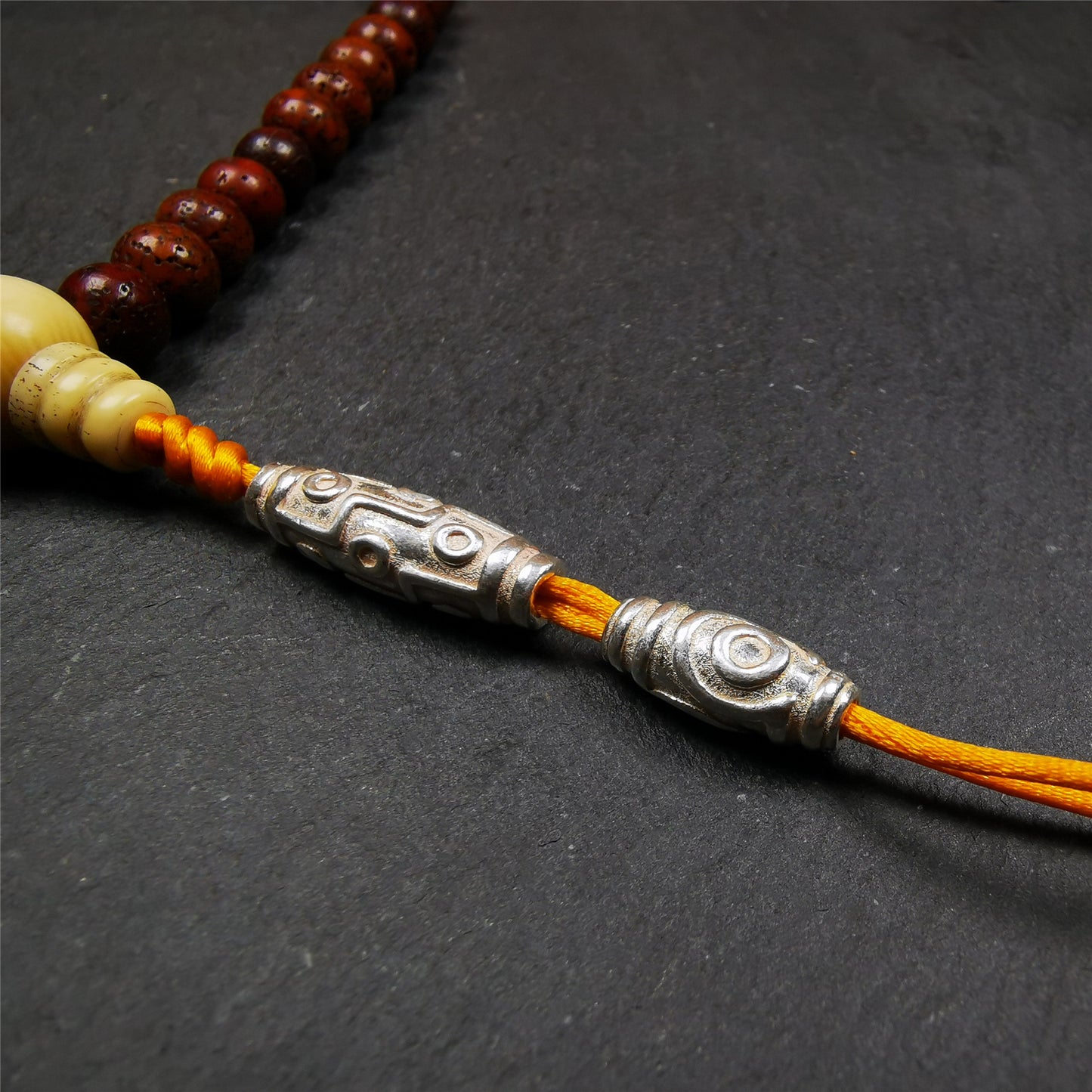 These silver dzi beads were made by Tibetan craftsmen. Made of sterling silver, you can use it as a mala pendant,spacer bead, or jewelry accessory.