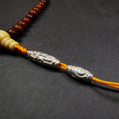 These silver dzi beads were made by Tibetan craftsmen. Made of sterling silver, you can use it as a mala pendant,spacer bead, or jewelry accessory.